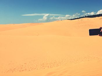 Scenic view of desert against sky