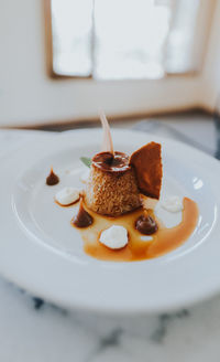 Close-up of dessert in plate on table