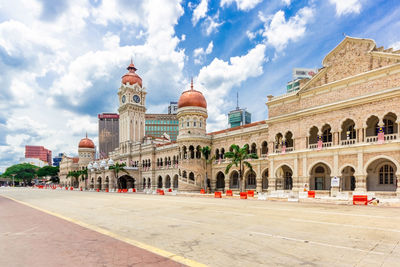 Facade of historic building against sky