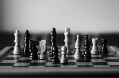 Close-up of chess pieces on board