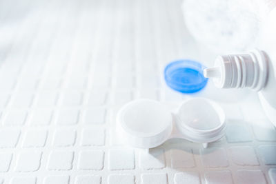 High angle view of bottles on table