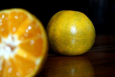 Close-up of oranges on table