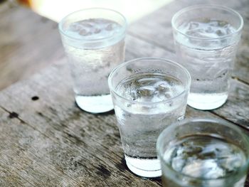 Drinking glasses on wooden table