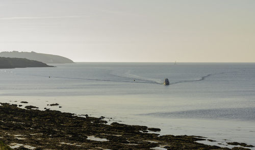 Scenic view of sea against clear sky