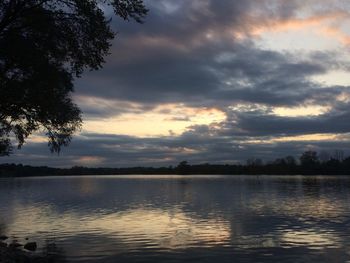 Scenic view of lake against sky during sunset