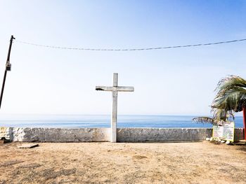 Scenic view of beach against clear sky