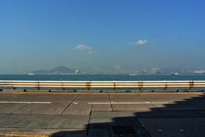 Scenic view of sea against blue sky