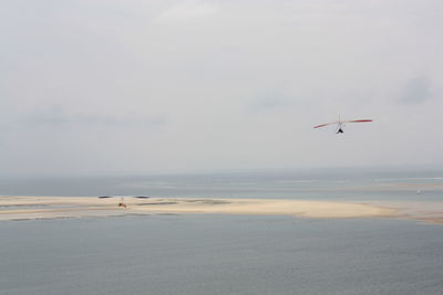 Parachute flying over sea