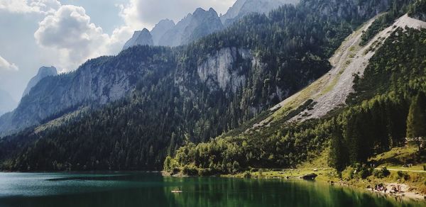 Panoramic view of lake and mountains against sky