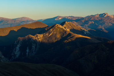 Scenic view of mountains against clear sky