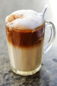 Close-up of coffee cup on table