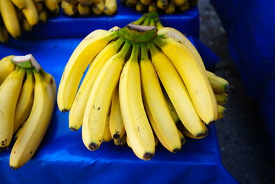 Close-up of yellow fruits for sale at market stall