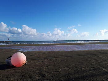 Scenic view of beach against sky