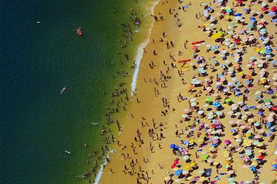 People on beach from above