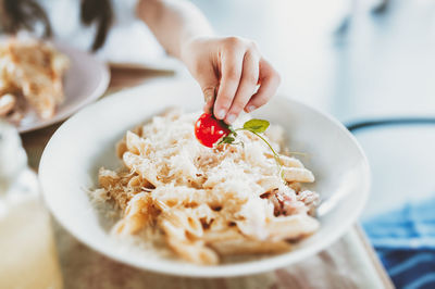 Close-up of woman holding food