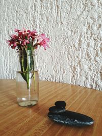 Close-up of flower vase on table