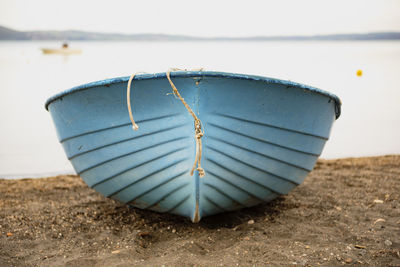 Close-up of sunglasses on beach