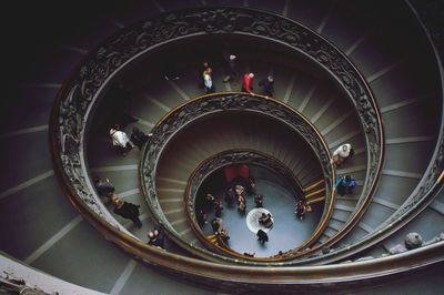 High angle view of people in spiral staircase