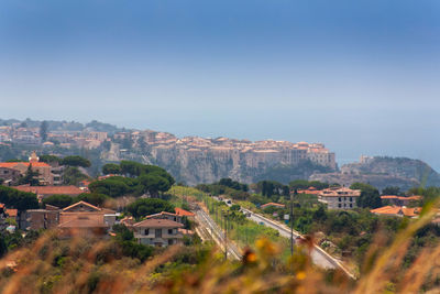 Aerial view of townscape against sky