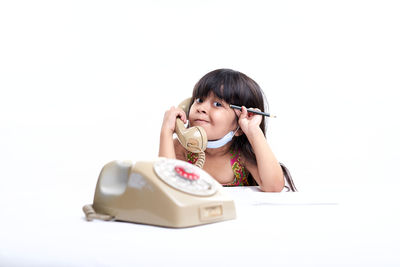 Portrait of a girl over white background