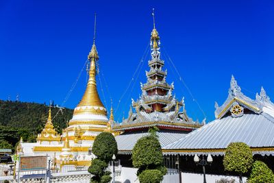 Temple against clear blue sky