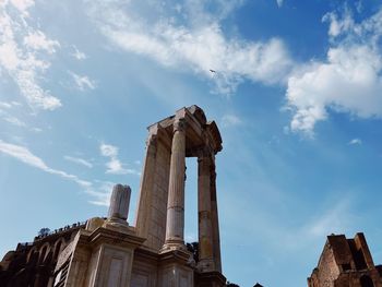 Low angle view of old ruins against sky