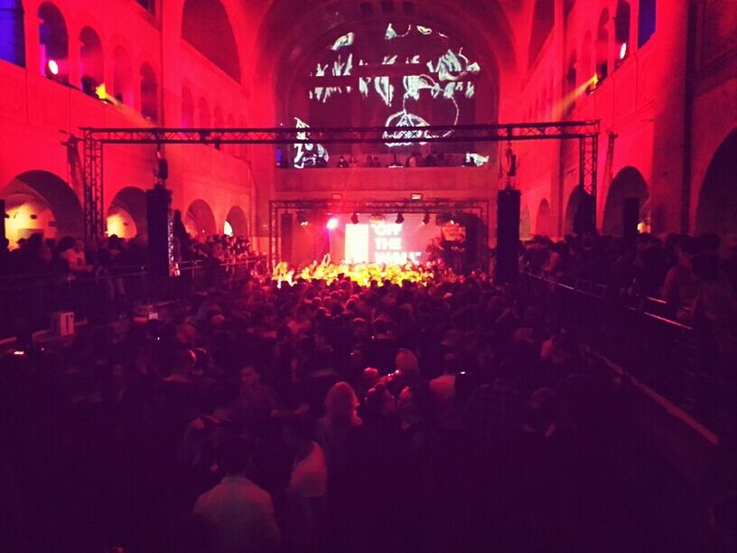 large group of people, crowd, person, illuminated, indoors, lifestyles, men, arts culture and entertainment, leisure activity, music, night, enjoyment, togetherness, stage - performance space, nightlife, event, celebration, performance