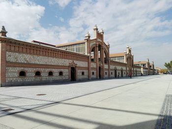 View of historical building against cloudy sky