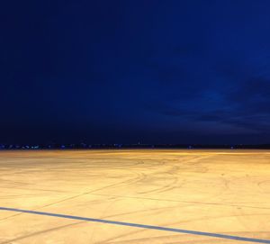 Scenic view of landscape against sky at night