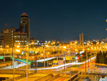 High angle view of illuminated city at night