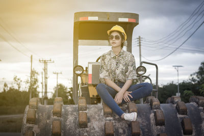 Portrait of boy sitting outdoors