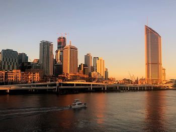 City by buildings against sky