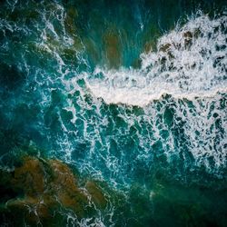 Full frame shot of rocks in sea