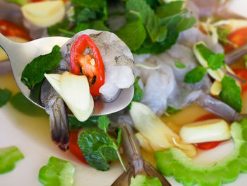 Close-up of chopped fruit salad in plate