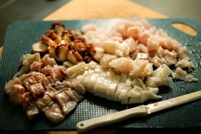 Close-up of fish served on table