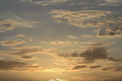 Low angle view of clouds in sky during sunset