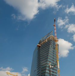 Low angle view of modern building against sky