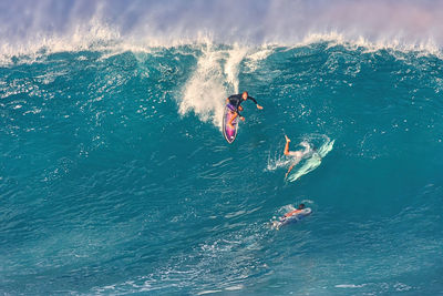 High angle view of people in sea