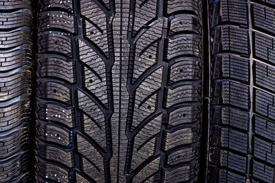 Abstract background with car tire tread texture, close-up