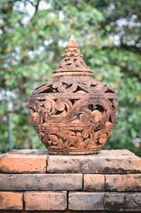 Close-up of statue against temple