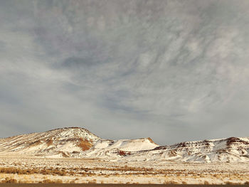 Scenic view of snowcapped mountain against sky