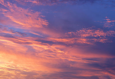 Low angle view of clouds in sky during sunset