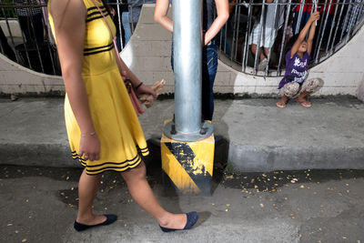 Low section of men on street