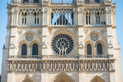 Notre dame de paris - famous cathedral with blue sky before fire april 15, 2019