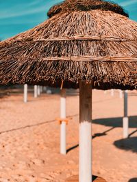 Close-up of roof on sand at beach