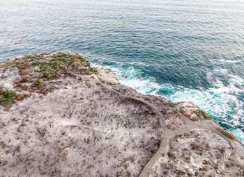 High angle view of rocky beach