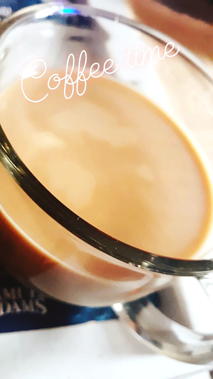 food and drink, close-up, drink, indoors, refreshment, still life, no people, food, cup, text, kitchen utensil, table, coffee - drink, freshness, reflection, coffee, hot drink, mug, coffee cup, high angle view, glass