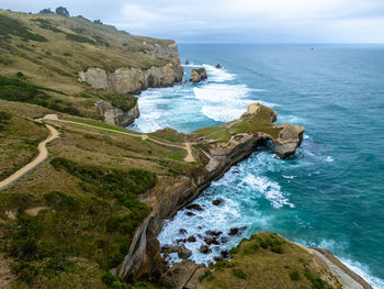 High angle view of sea and mountains