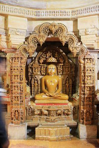 Statue of temple in building