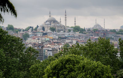 Distant view of historic mosques in city